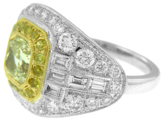 Platinum and 18kt yellow gold Y-Z color radiant cut diamond ring